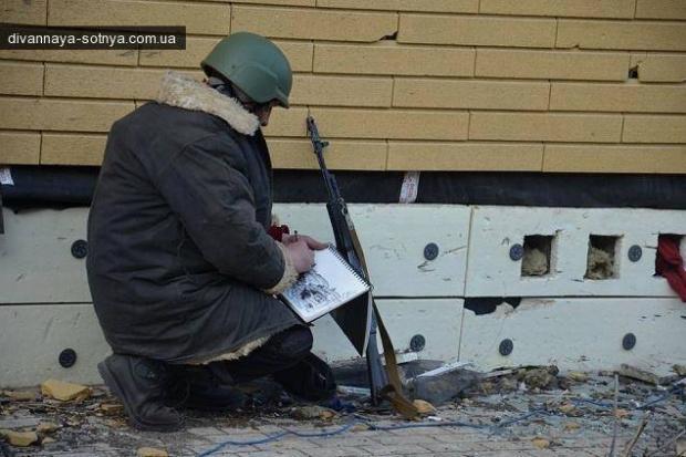 Калуський художник Володимир Безрукий малює зруйновані будівлі, села та обличчя військових