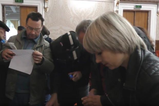 Близько половини учасників АТО на жеребкування не прийшли | Фото: Скрін з відео